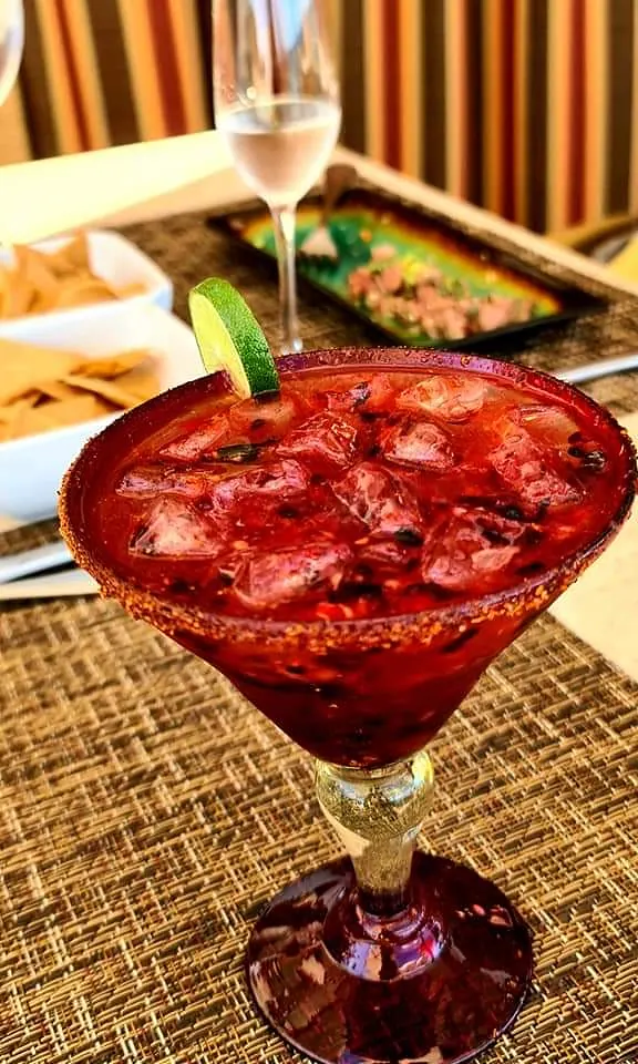 Red margarita with a salted rim